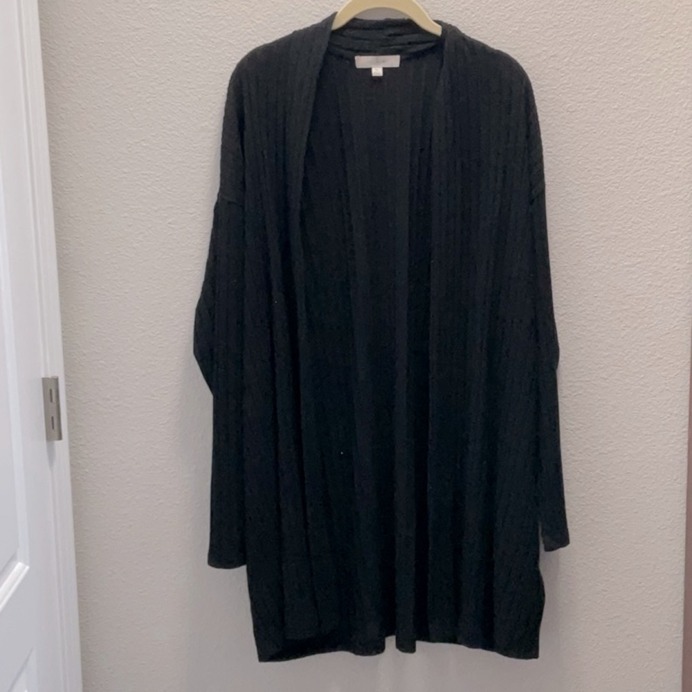 Eri &this is carried by Anthropologie. This navy blue sweater is thick and warm.